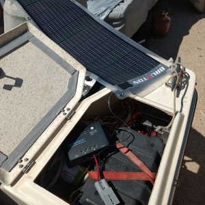 Someone gave me a 14 watt panel, which is perfect for keeping my batteries topped off (test run going on here). 

Bought a 30 amp controller which I'll mount in the cabin and eventually add a couple panels to the roof rack. We plan on getting a fridge in the near future so solar will be a big help with that.