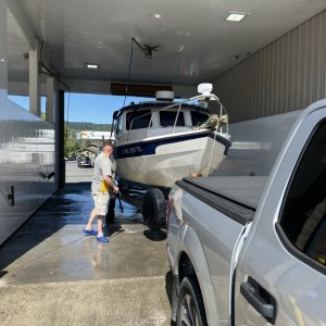Cleaning the scum off C-Traveler after slinging out at Cap Sante