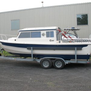 Our boat and trailer rode out on a fifth wheel flatbed trailer, no worse for wear