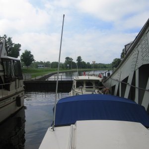 Peterboro lift lock.  This is a hydraulic lock, the largest in North America.  We have all five boats in a large pan at the bottom, next to us at the top is another pan that the lockmaster will fill with water, the weight of that pan is great than ours - therefore we go up while it goes down, simple as pie