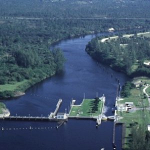 St. Lucie Lock: Lock chamber:50'x250'- Vertical lift:Sea level to current St. Lucie Canal water level 14.5' normal. Operates daily 6:00A to 9:30P-Marine VHF radio Channel 13-Located at Okeechobee Waterway 
statute mile 15.5