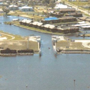 Arial view Clewison Lock- entrance to Roland Martin Marina and U.S. Army Corp of Engineers office:  This is a "pass thru lock" most of the time, exception, it is closed due to a huricane.  Route 2 or the Rim Canal continue to Port Mayaca from here.  This is the start/end of Route 1 across The Big "O" to Port Mayaca.