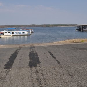Launch ramp.  It was wide, and seemed to have a long enough apron so the trailer wheels didn't go off the end.  There was a dock around to the left, but it was pretty shallow.  We used the Marina office dock.