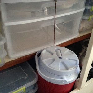 Small bungee to prevent drawers from sliding open while underway