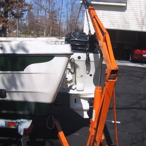 On this warm March day, with my wife and son helping me, let's hang it!