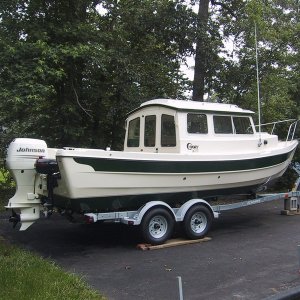 By May, we have Greeniron ready for sea trials. Only problem was motor would not run much above idle. Bypassed fuel selector valve, ran good. Later, took valve apart, what a mess,  all gooped up with sealer, and plumed wrong.