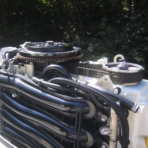 Change cam drive belt on 2002, 70hp Johnson. Service manual said do @ 200 hours. Now it's been extended to 800 hours.