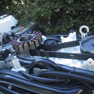 Remove alternator, and belt tension pulley.