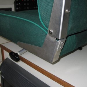 (Sea Skipper) Pilots seat raised 2-3/4?, swivels & slides and back of seat can be adjusted for a more vertical posture.