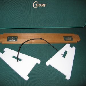 Dinette Table Cockpit Mounting 5.JPG 

Bungee cord makes it less likely to loose one of the pieces overboard.