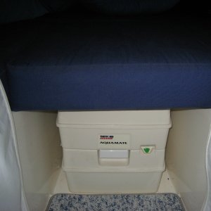 Potty with v-berth cushion in place. Height is tight fit but doable.