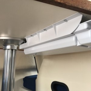 Installed drawer under table.