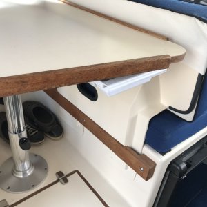 Installed drawer under table.