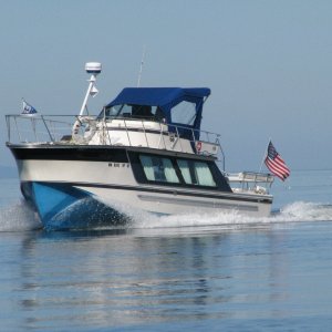 Seen at John Wayne and off Protection Island, Strait of Juan de Fuca.  An interesting design.  Roomy.  Only saw this boat one time.  Built in the Netherlands, for big water, if I remember right.  Would like to know more about it.