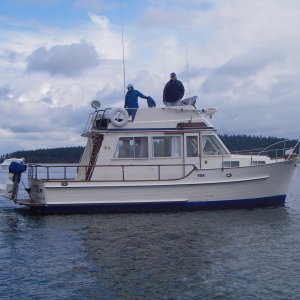 The "Islander" out for a spin. A father daughter team.  Nice boat out of John Wayne.  I believe it is currently for sail-(5-7-11).