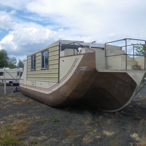 Found "The Ark", in a 2nd hand lot in NE Oregon.  It's not for sale, daughter thinks it might leak.  Home built, Steel hull.