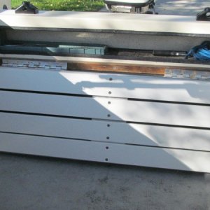 Seat in the down position.
Main Frame:  formed aluminum
Top:  StarBoard & stainless steel hardware