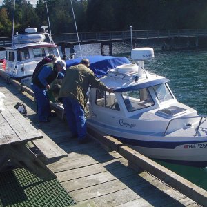 Looking over the "Stretch 16" C-Voyager at SBSP dock,) Sequim Bay CBGT-07.  Dreamer, a TomCat 255 just aft.