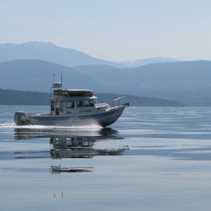 JC Lately, west bound, between Protection Island and Sequim Bay, Juan de Fuca Strait, on a glassy flat fine day.