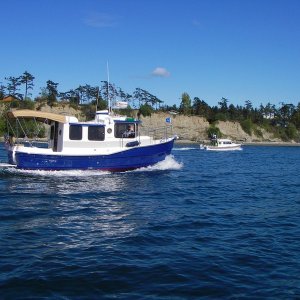 Ranger tug and C-Dory headed into Fishermans Bay, Lopez Island.