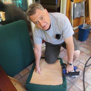 stapling new foam and clean covers to seats