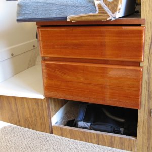 Two new drawers.  Mahogany fronts.  Pico chair (folding chair in a bag) stowed underneath.