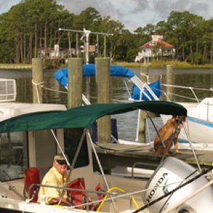 Cap\'n Pat and Skipper the Dog at the Donna Marie