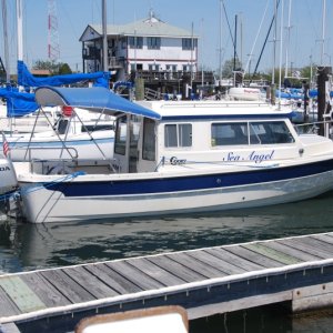 Sea Angel awaiting departure after a wonderful lunch and fellowship. We ate in the white building in the background.