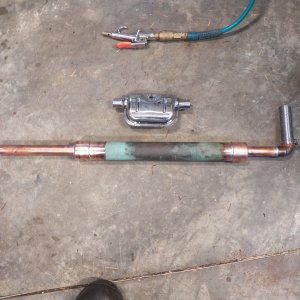 I bought a stainless muffler only to find out that it is not for inhabited space.  It is spot welded and not airtight, so it will not work for my application.  I made one out of some scrap copper plumbing pipe.  It is a glass pack style of muffler.