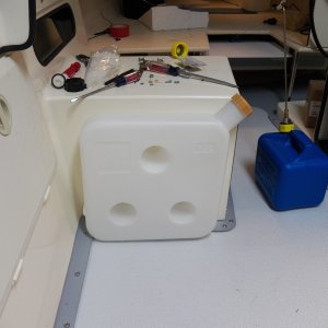 I bought a 2 gallon tank that I was hoping would fit under the seat box.  Not quite.  I would have had to make some changes to the box that I wasn't willing to do, and I didn't want the tank sitting out where it is now.  The $75 tank goes back on Ebay.  The $15 blue tank wins the day.