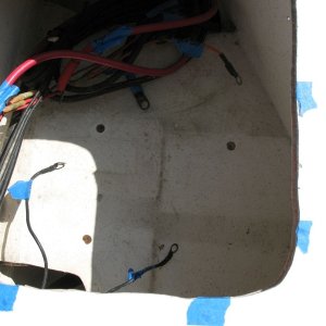 Battery tray holes over-drilled to be filled with thickened epoxy (not re-using this fastening method for batteries).  Also edges of locker bottom (which were raw balsa) were removed and filled with thickened epoxy.