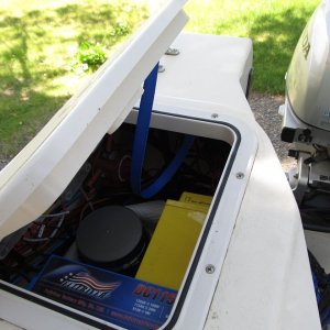 Strap was set up such that it would fall into the locker when closing the lid (vs. getting in the way of the closure).