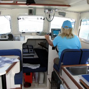 The Blonde at the helm