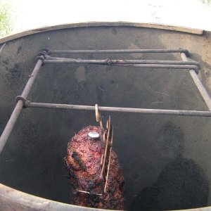 No explanation needed. Prime rib roast (bone removed) with thermometer.