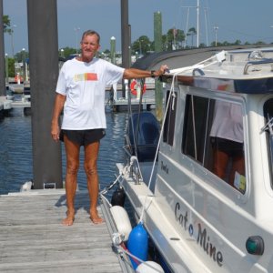 Our wet slip at NAS Pensacola.  Always broadside to the south wind, so pivot against the next wood piling and aim for my fenders attached to the dock.  Wish we could get a midship cleat on this side!