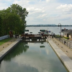 Chambly canal lock 1 bypasses part of the Richlieu river and canal in background.