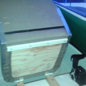 Helm seat folds forward, storage underneath.