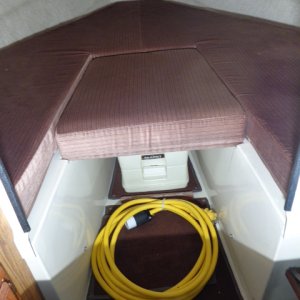 Upholstered V-Berth,
Porta Potty and
Shore Power Cord