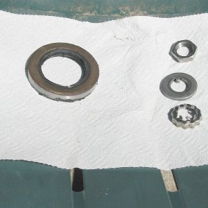 Seal, nut, washer, keeper