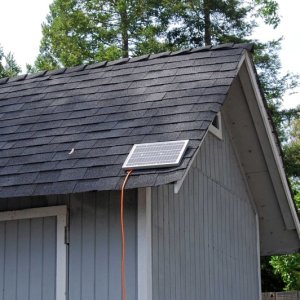 12 watt Solar Panel (battery maintainer)
Mounted on storage shed roof near boat. Took 50' extention cord and cut 18" off female end and attached it to a small solar controller (picture 3) in Lazerette attached to main cranking battery. Attached the long piece to the Solar panel. When connected (pic 2) I have automatic battery maintenance. I leave switch on both so the whole system is maintained. A small switch was added to turn off the battery combiner during solar charging.
