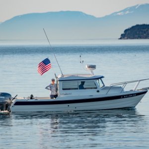 My wife and I returning from a beautiful day on the water and my youngest son was on the beach with his camera.