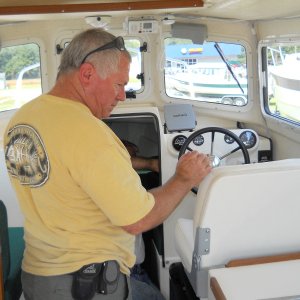 Checking out the new boat to take delivery