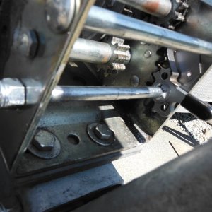 The bolt now goes completely through the winch adding much needed strength/rigidity and a slip nut holds the ratchet assembly in place.