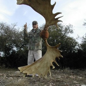 Gary with World Record Moose Horns, Taken at Wildman Lake Lodge, AK