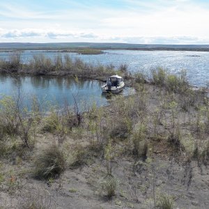 It is difficult to go ashore because most of what shows as islands on the chart is patches of marsh vegetation.  This one had a sand bar with a really deep pool.  Sat on the hill and watched stuff through the binoculars.  Forgot about taking pictures.