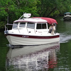 Freedom and three others coming out of the cut from the St. John's River to the Hontoon Dead River.  That's Mary McLain (Freedom) taking the photo of me taking a photo.