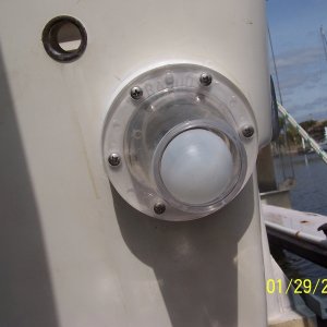 6 stainless steel screws, wipe the caulking off and you are done.