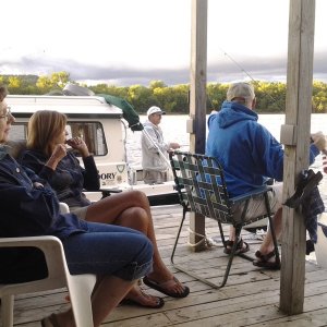 Fishing and conversation at the boat house