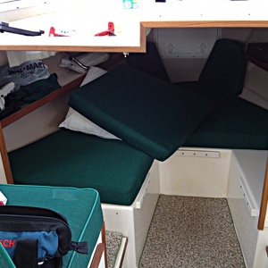 I cemented teak L-molding in place. The final step is to fill the gaps, sand, and finish-oil the surround.