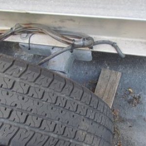 Note brake hoses sleeved in clear plastic tubing and tie wrapped to prevent rub through.